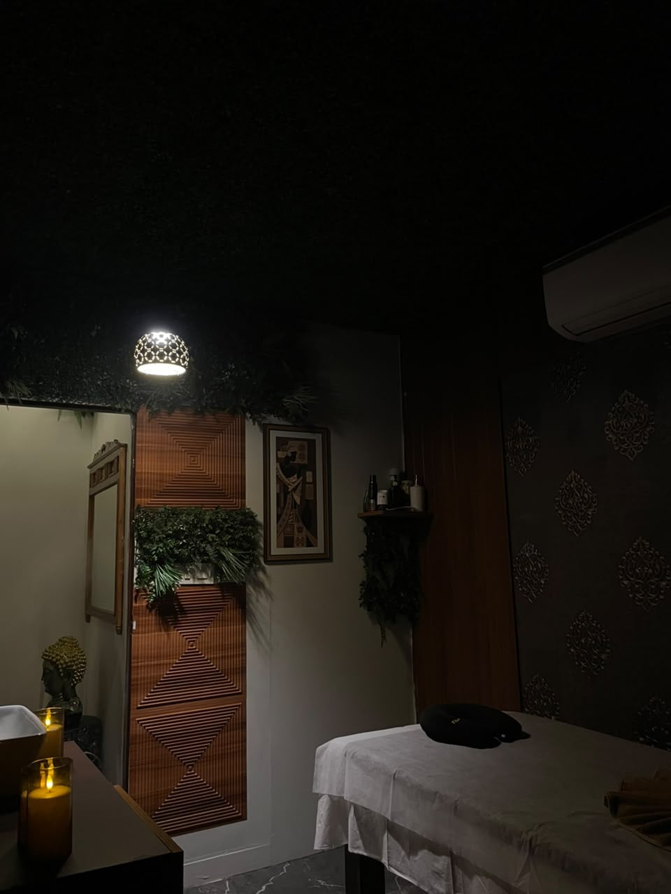 Candle-lit treatment room at Senses Wellness Spa