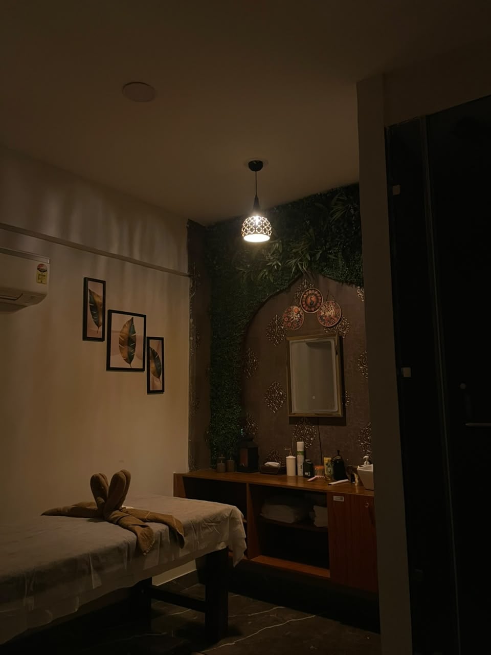 Warmly lit single treatment room at Senses Wellness Spa